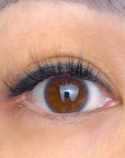 Close-up of a person's eye with pre-glued false eyelashes