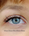 Close-up of a person's eye with map of press on lash clusters