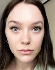 woman wearing cluster lashes