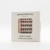 cluster eyelash packaging with 'prettyinthecity beauty' branding on a white background