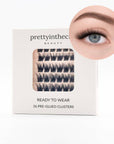 Press on eyelash packaging with a close-up of an eye wearing the lashes on a white background