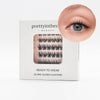 Eyelash packaging with a close-up of an eye wearing the pre-glued cluster lashes on a white background